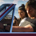 Jason al volante de un descapotable y Lucia en el asiento del acompañante en GTA VI