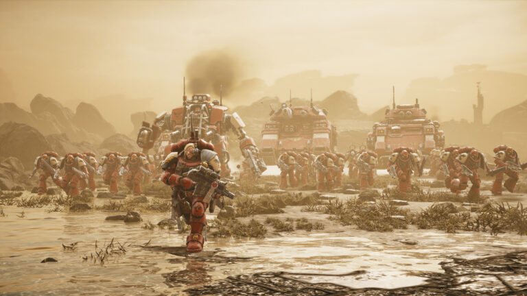 Un marine espacial avanza frente a vehículos y tropas de Dawn of War IV